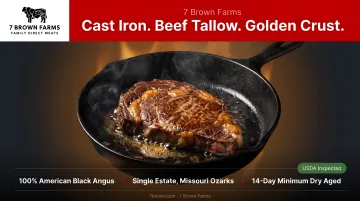 Cast iron skillet searing steak in beef tallow with golden crust