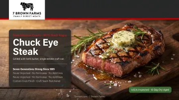 Grilled chuck eye steak resting on cutting board with herb butter melting