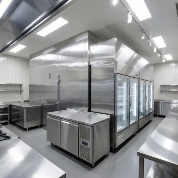 Commercial kitchen with multiple refrigeration units and professional equipment