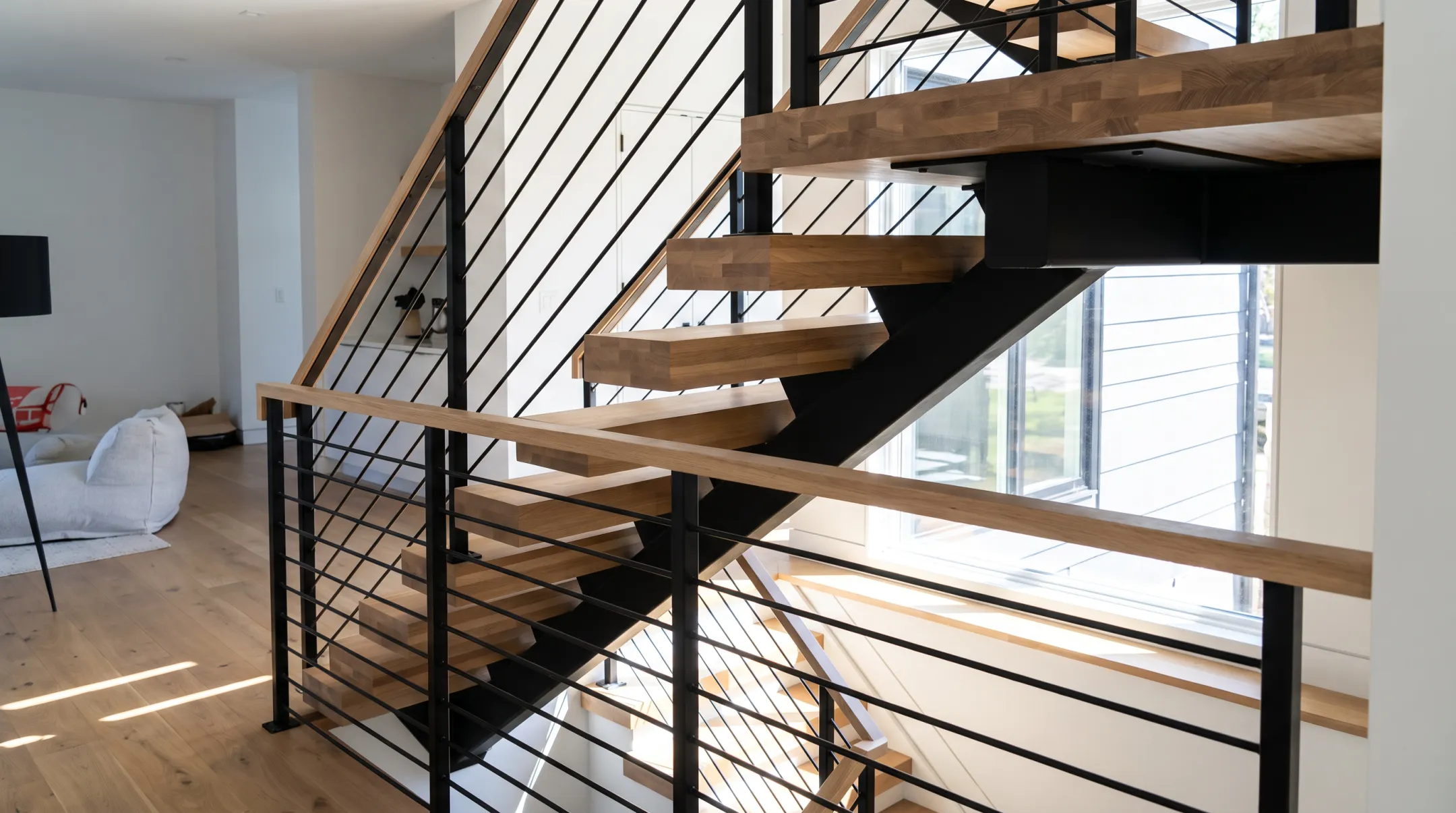 Custom modern staircase with metal, wood, and durable finished components