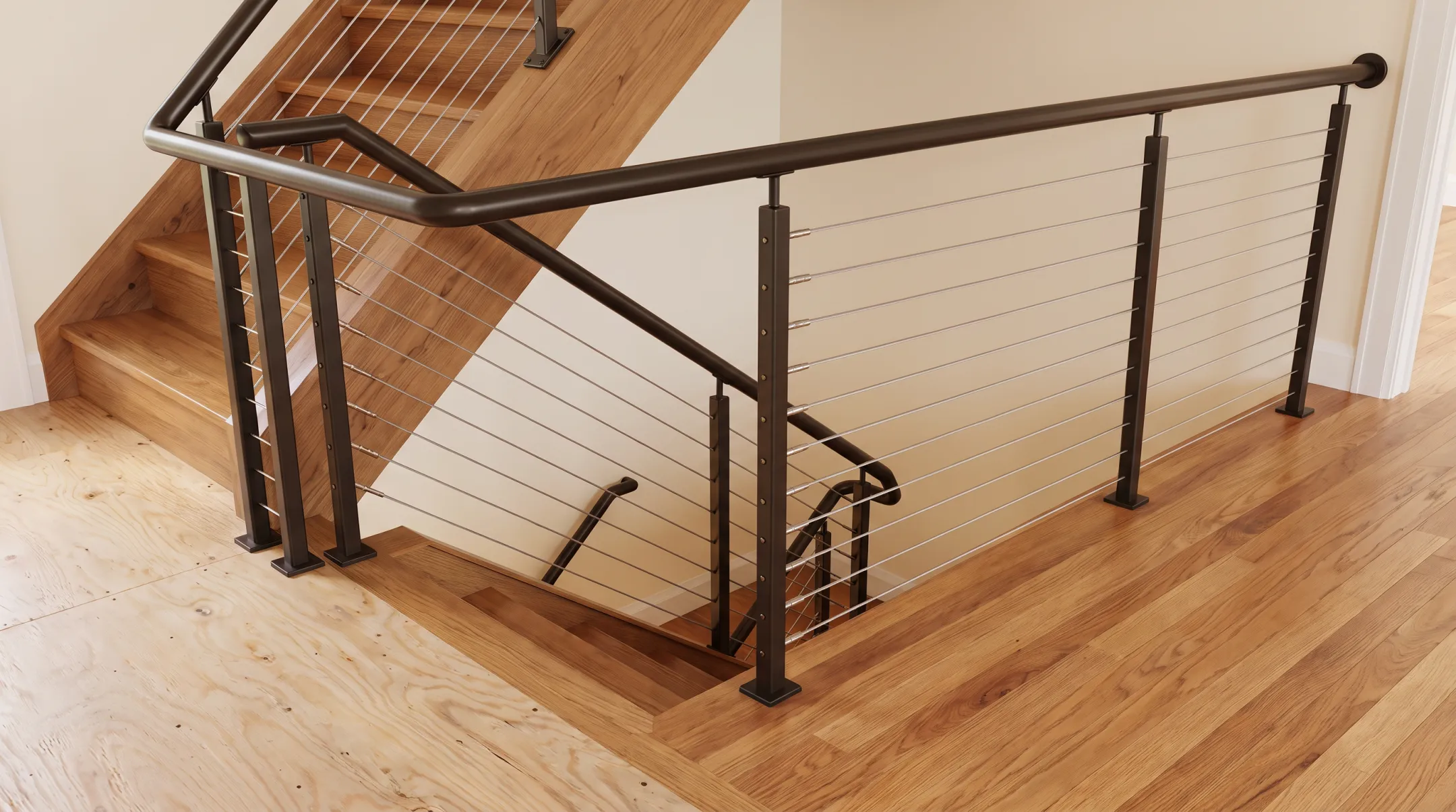 Custom steel and stainless cable stair railing installation