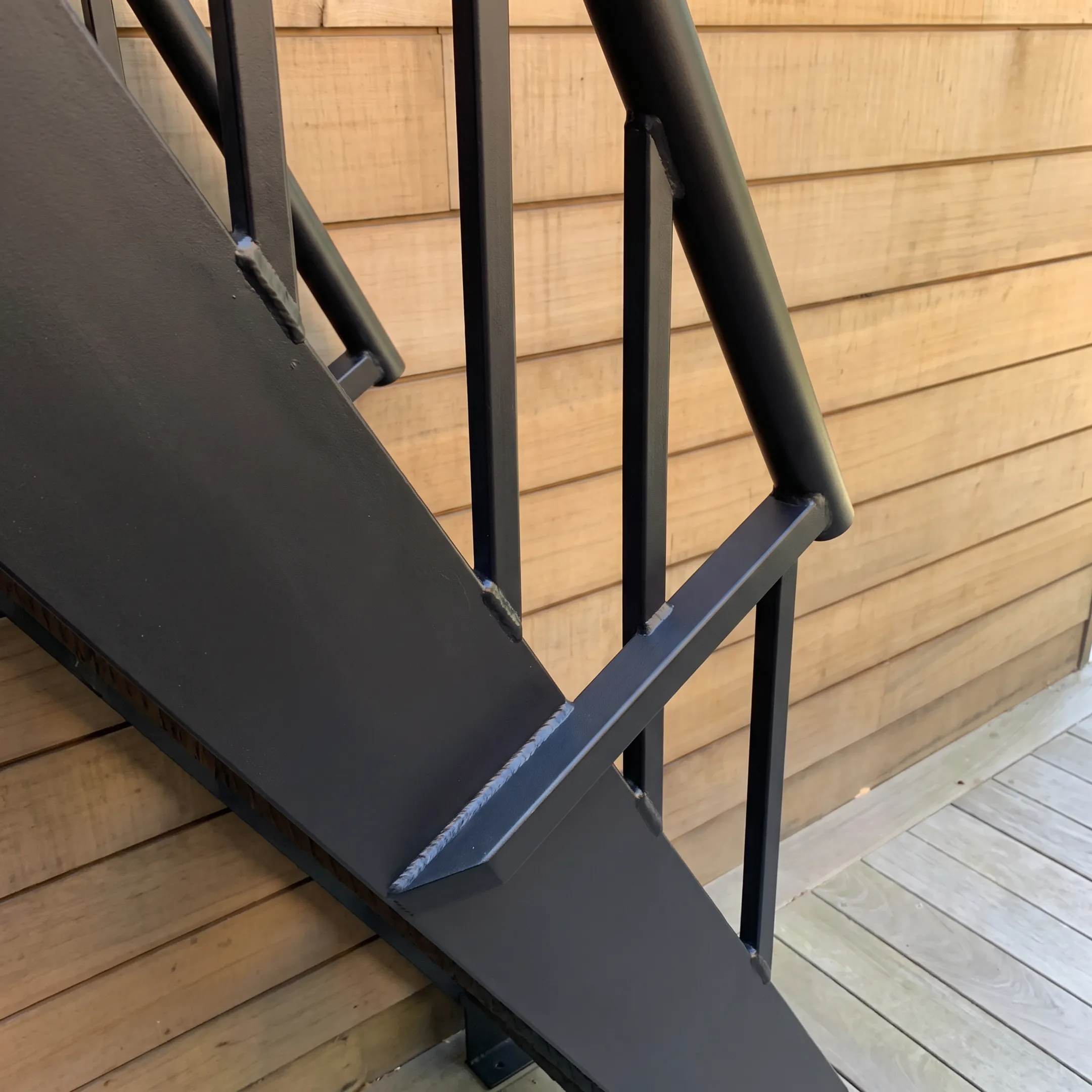 Fabricated architectural steel railing with sleek black finish