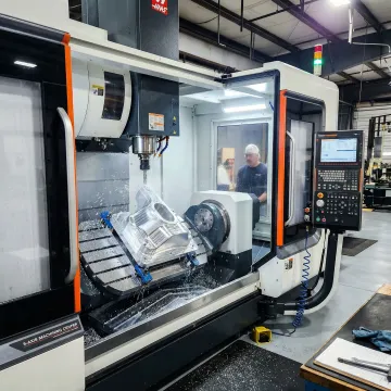 5-axis CNC machining center producing a precision metal component