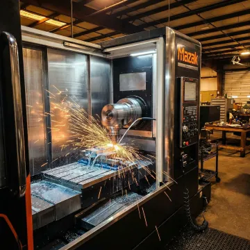 Precision CNC machining center producing custom metal parts with high accuracy