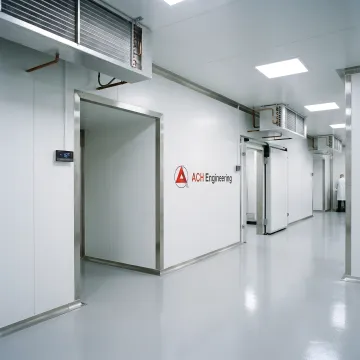 Modern modular cold room installation with stainless steel panels and temperature control systems