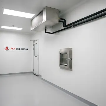 Modern modular cold room installation with stainless steel panels and temperature monitoring system