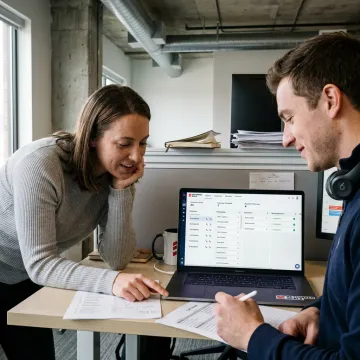 Sales team reviewing SDR outreach process