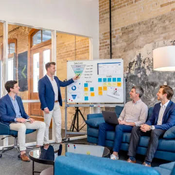 Sales team reviewing process map