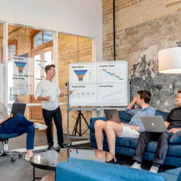 Sales leader reviewing growth strategy with a startup team