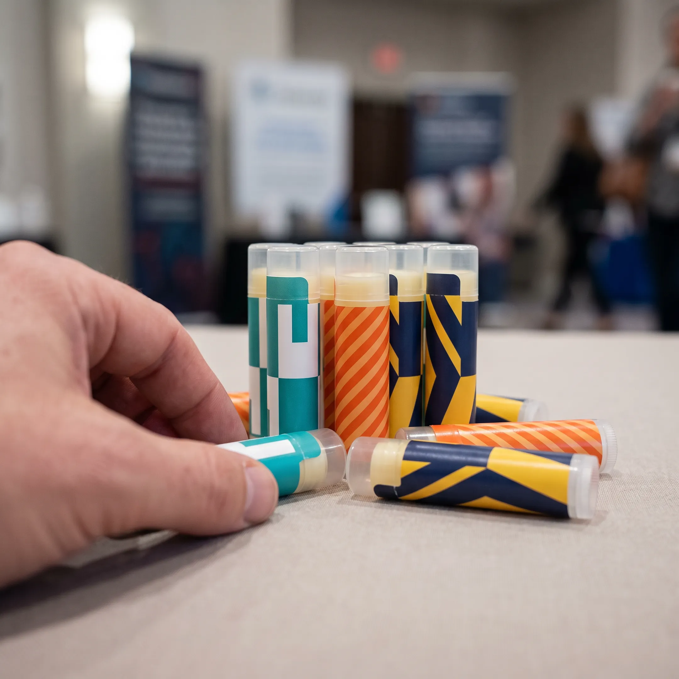 Branded chapstick products prepared for a promotional giveaway