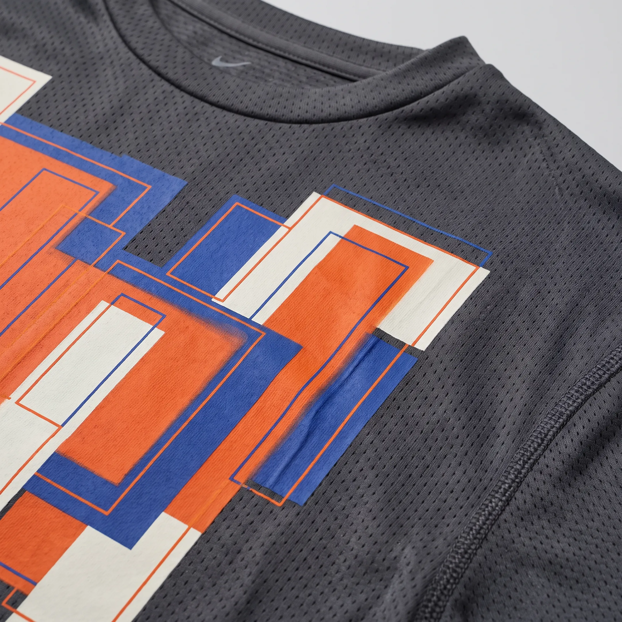 Close-up of a branded Dri-Fit team shirt logo