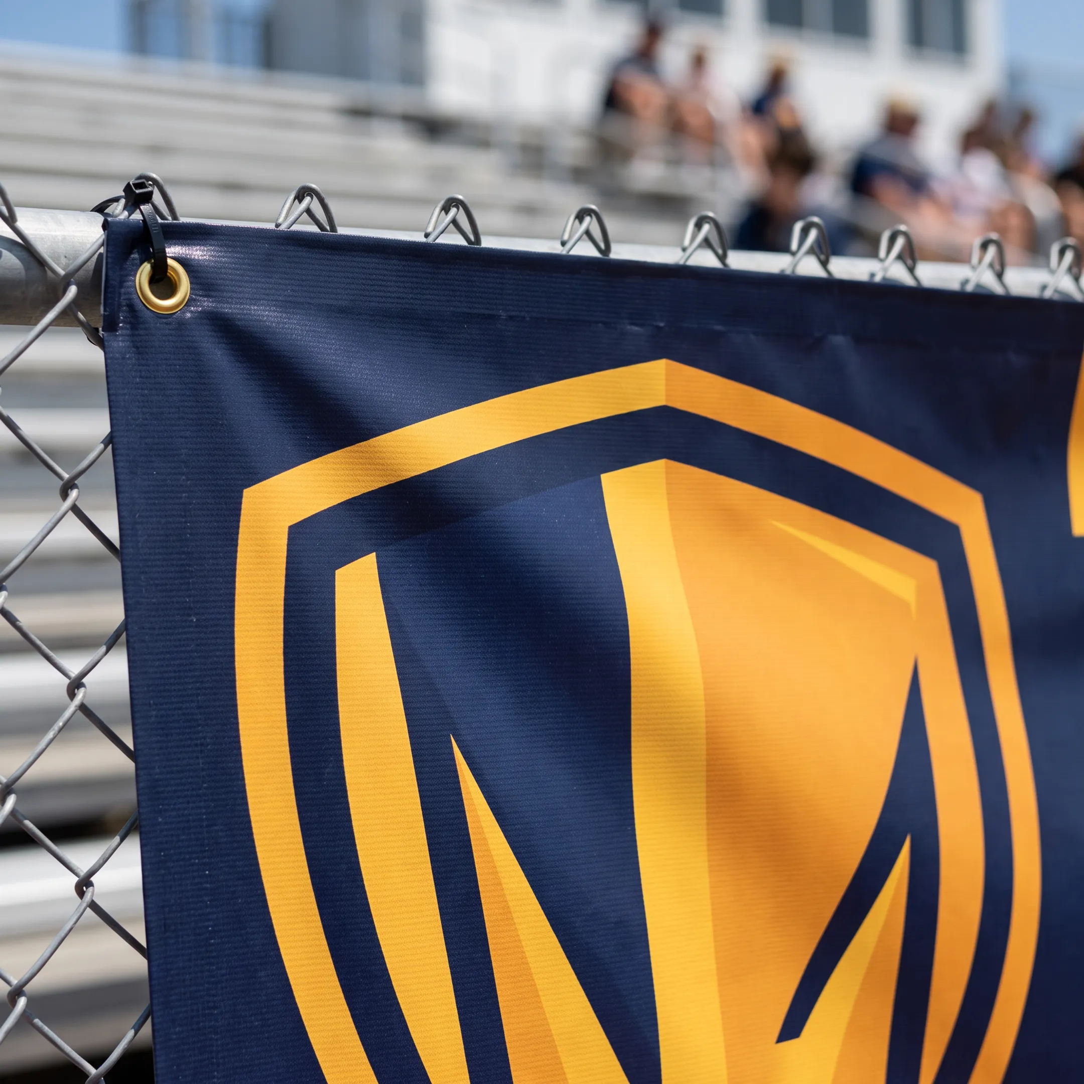 Printed sports banner featuring a team logo and colors
