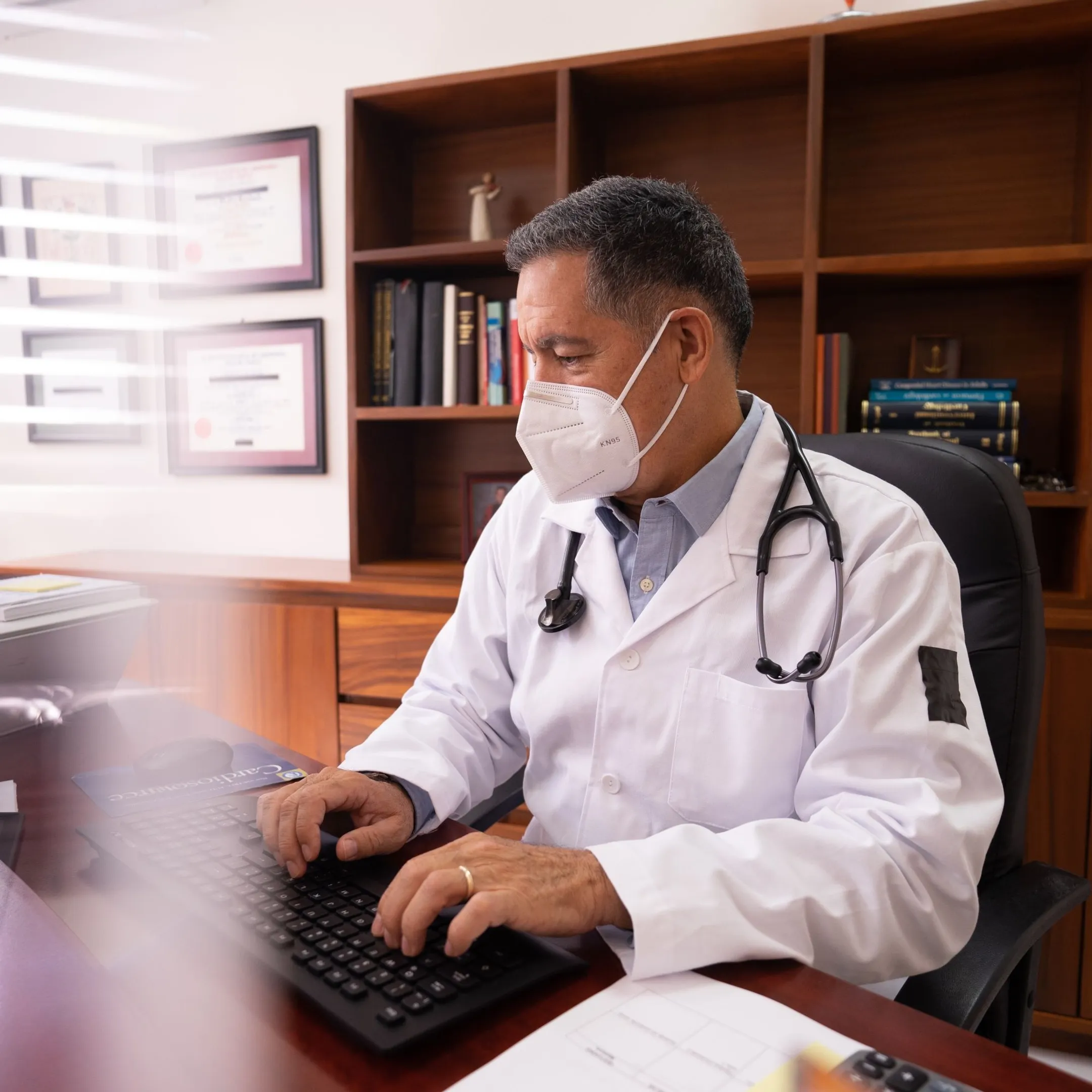 Clinician reviewing AI-assisted clinical documentation on a secure workstation
