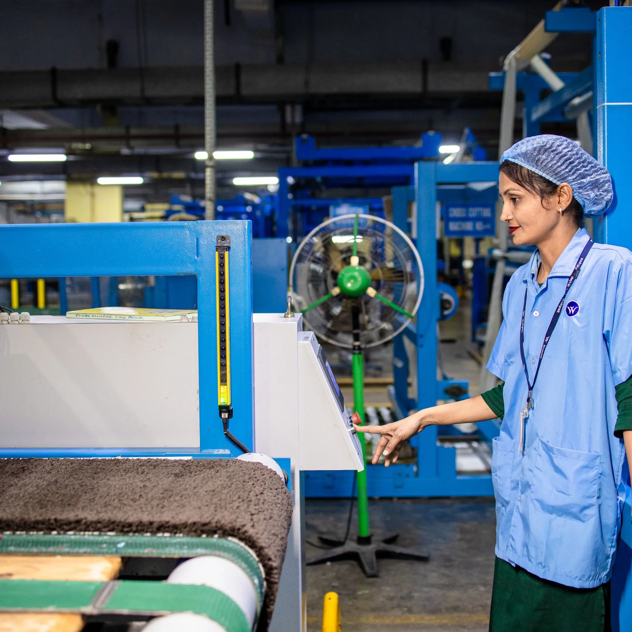 Manufacturing team reviewing private AI analytics on a production dashboard