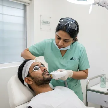 Clinician preparing laser beard hair reduction treatment