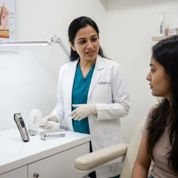 Dermatologist discussing facial hair removal options