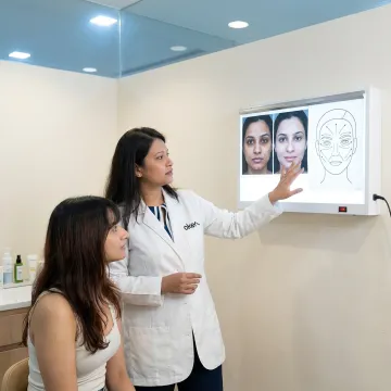 Dermatologist reviewing Botox results with patient