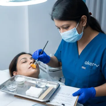 Dermatologist preparing gentle lip peel treatment