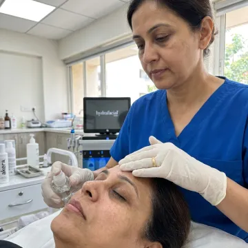 Dermatologist performing medifacial treatment