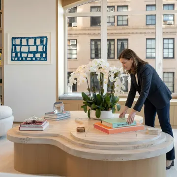 Professional organizer styling a bright home interior