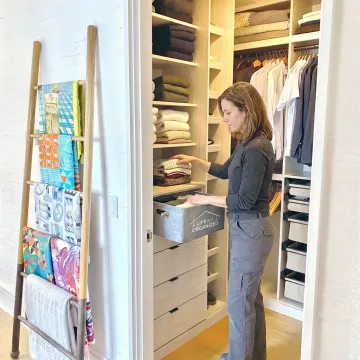 Professional organizer arranging a calm home space