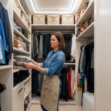 Organizer arranging a luxury closet system