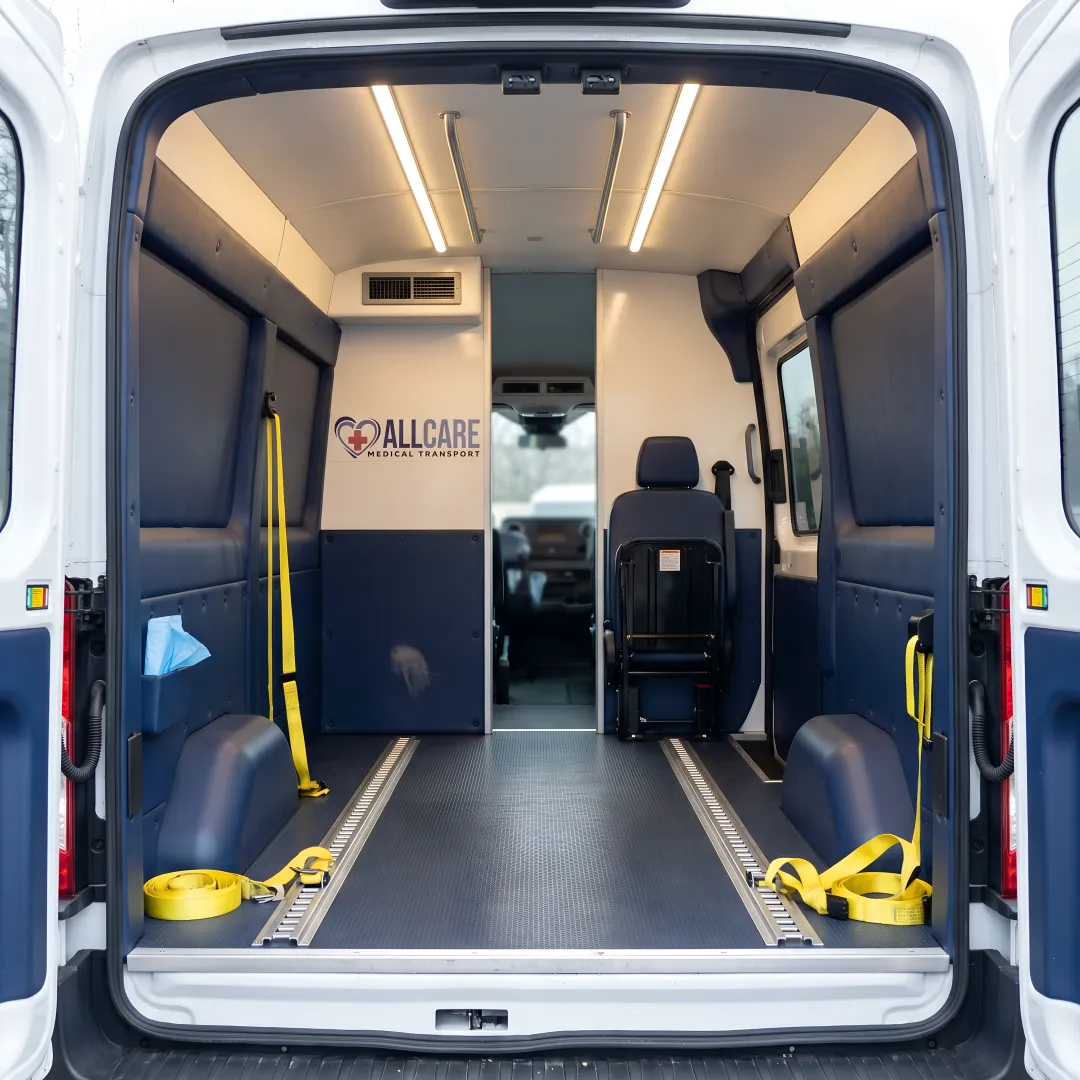 Interior of wheelchair-accessible medical van showing secure tie-down systems