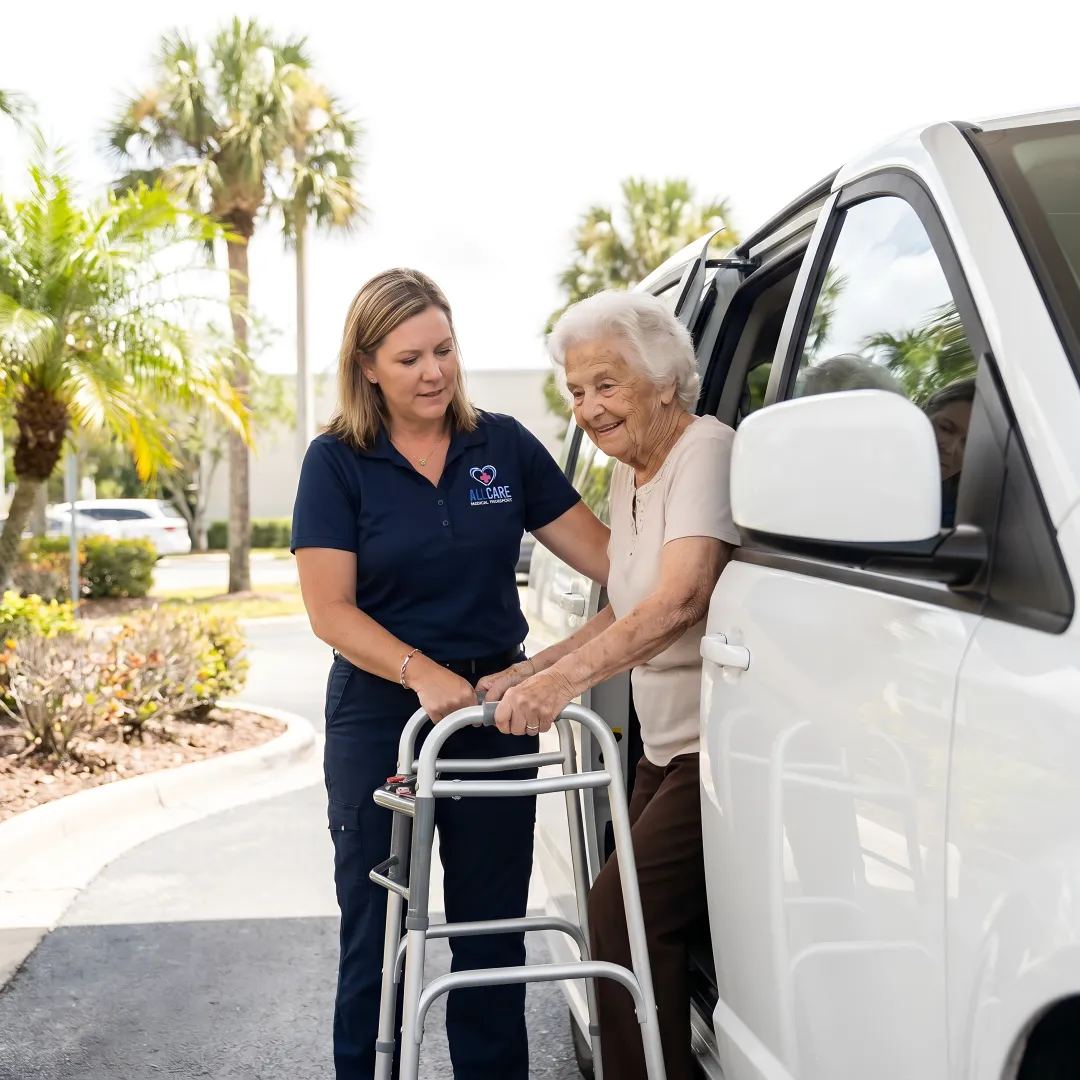 Compassionate medical transport specialist assisting elderly woman into vehicle