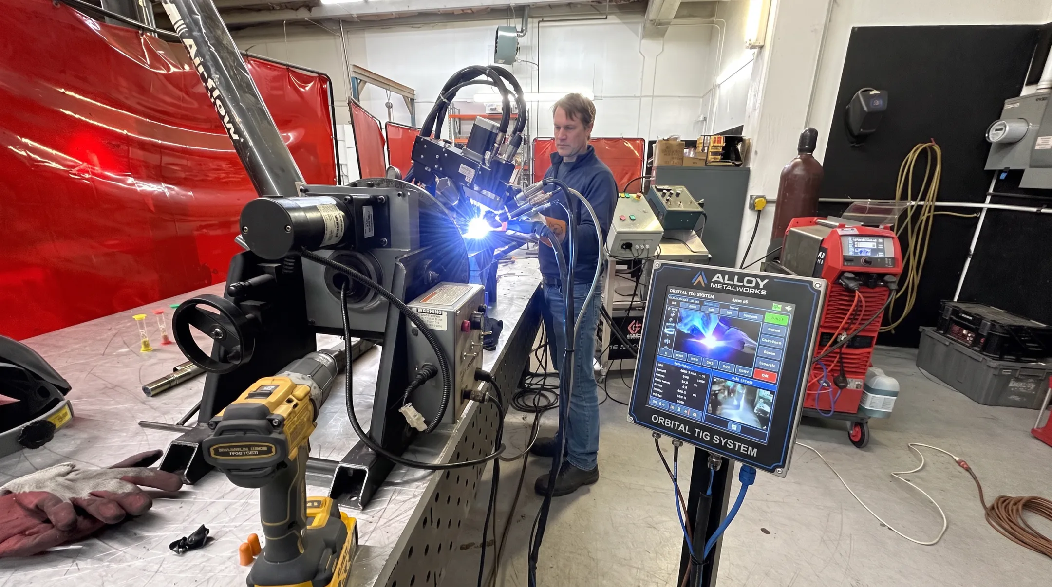 Shop-built orbital TIG welding system processing Inconel superalloy tubing