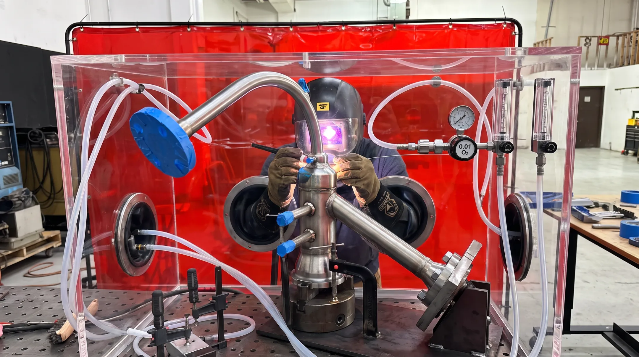 Custom inert gas chamber setup for titanium vessel welding process