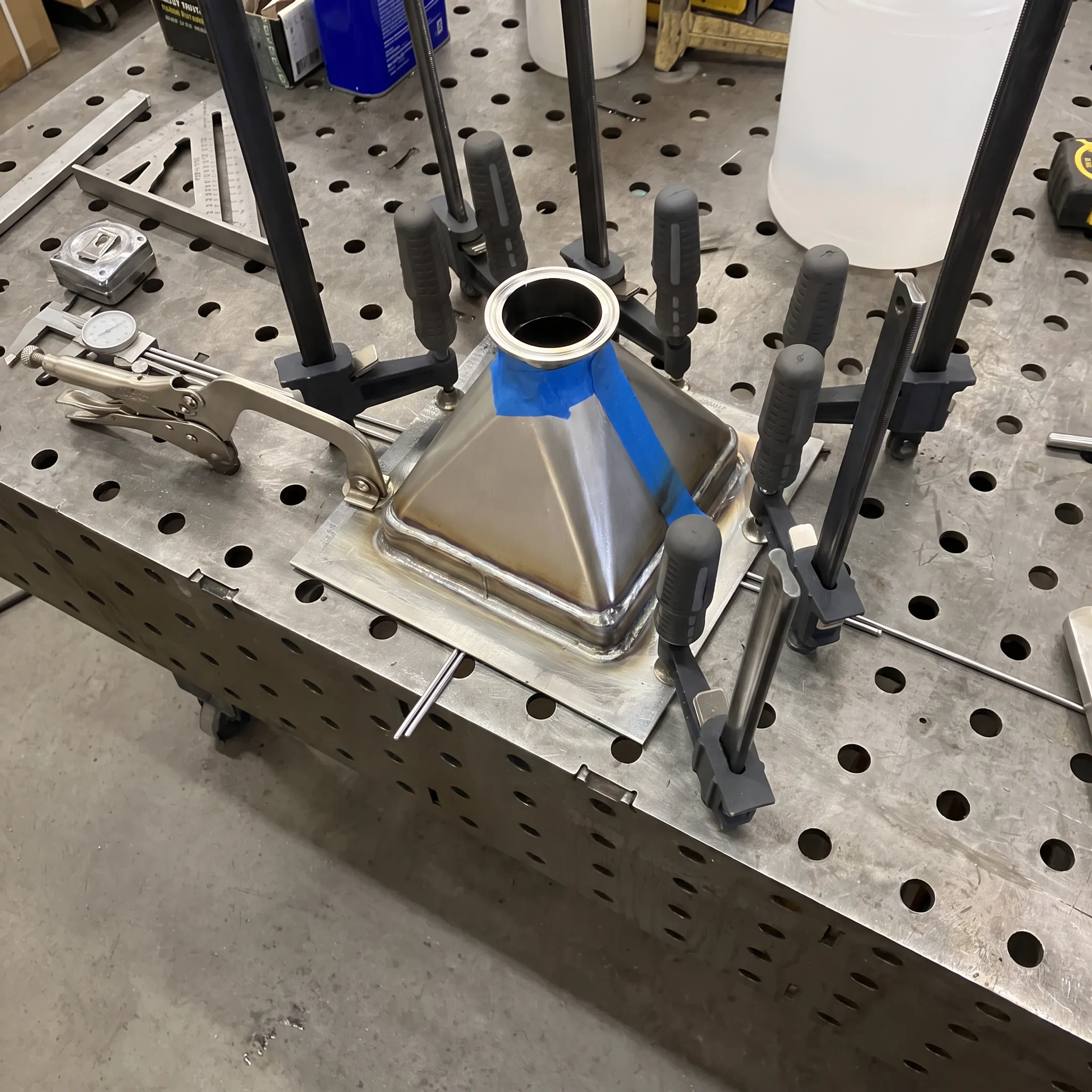 Precision welded vacuum chamber assembly