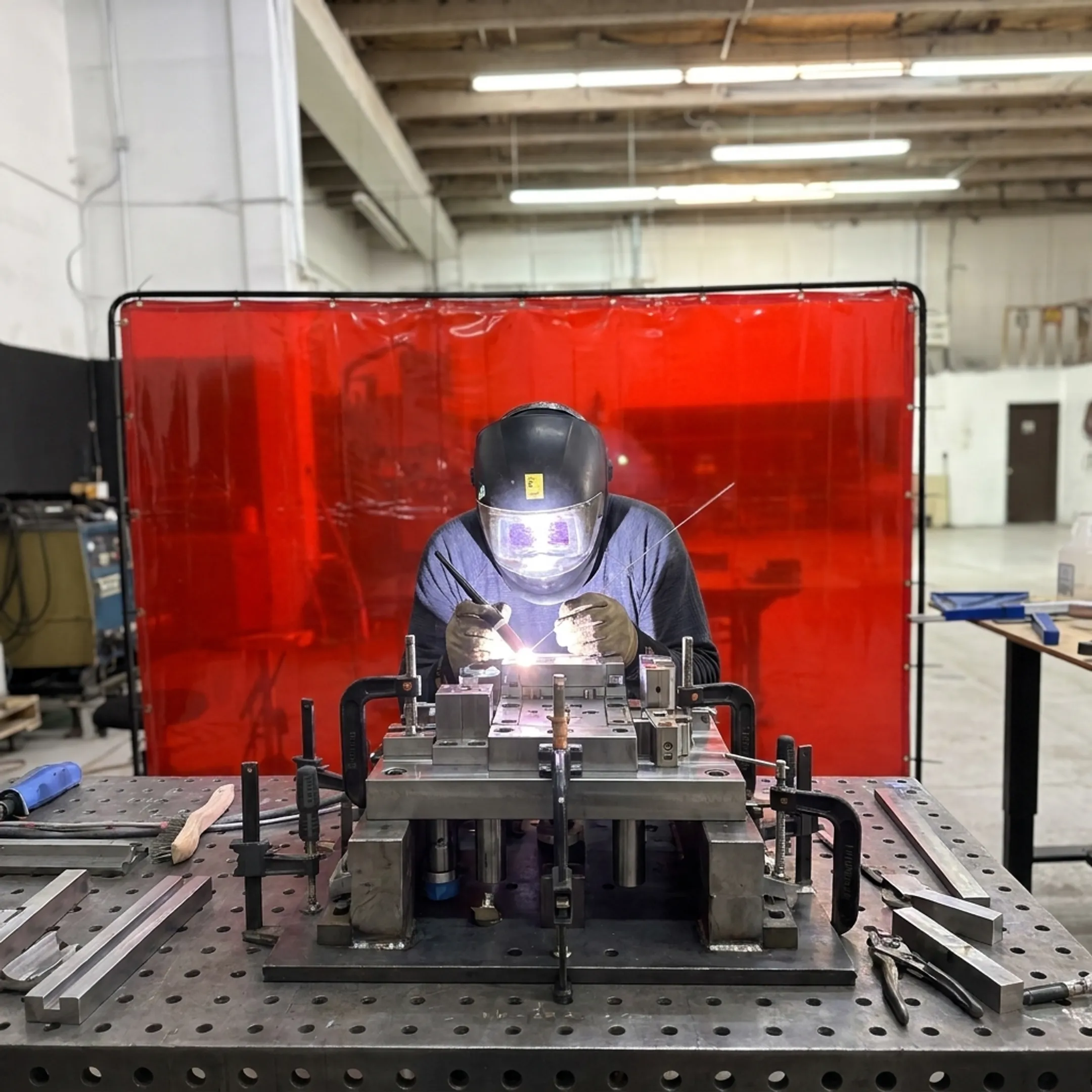 Precision welding of a tool and die assembly