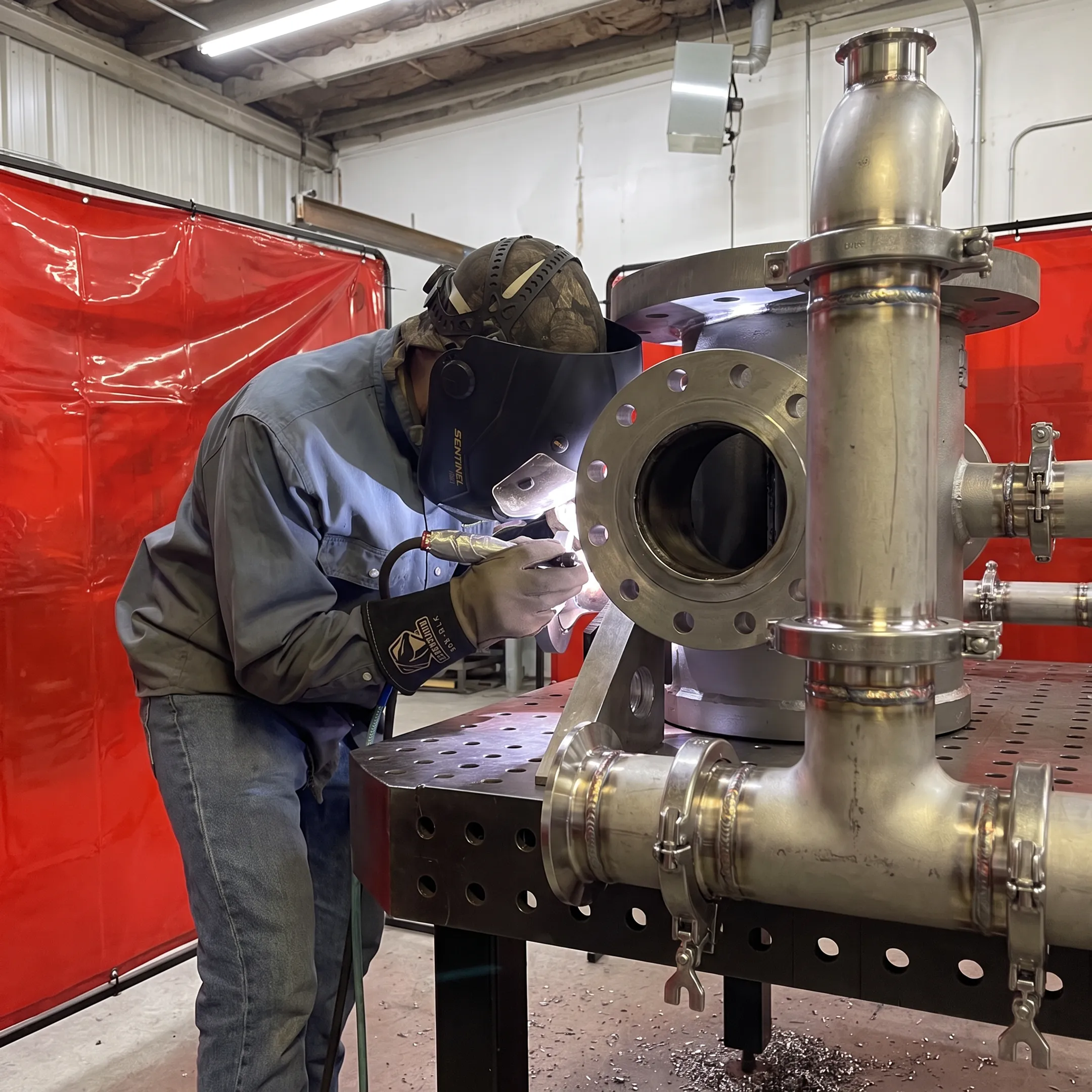 Industrial piping and welding fabrication in a technical shop
