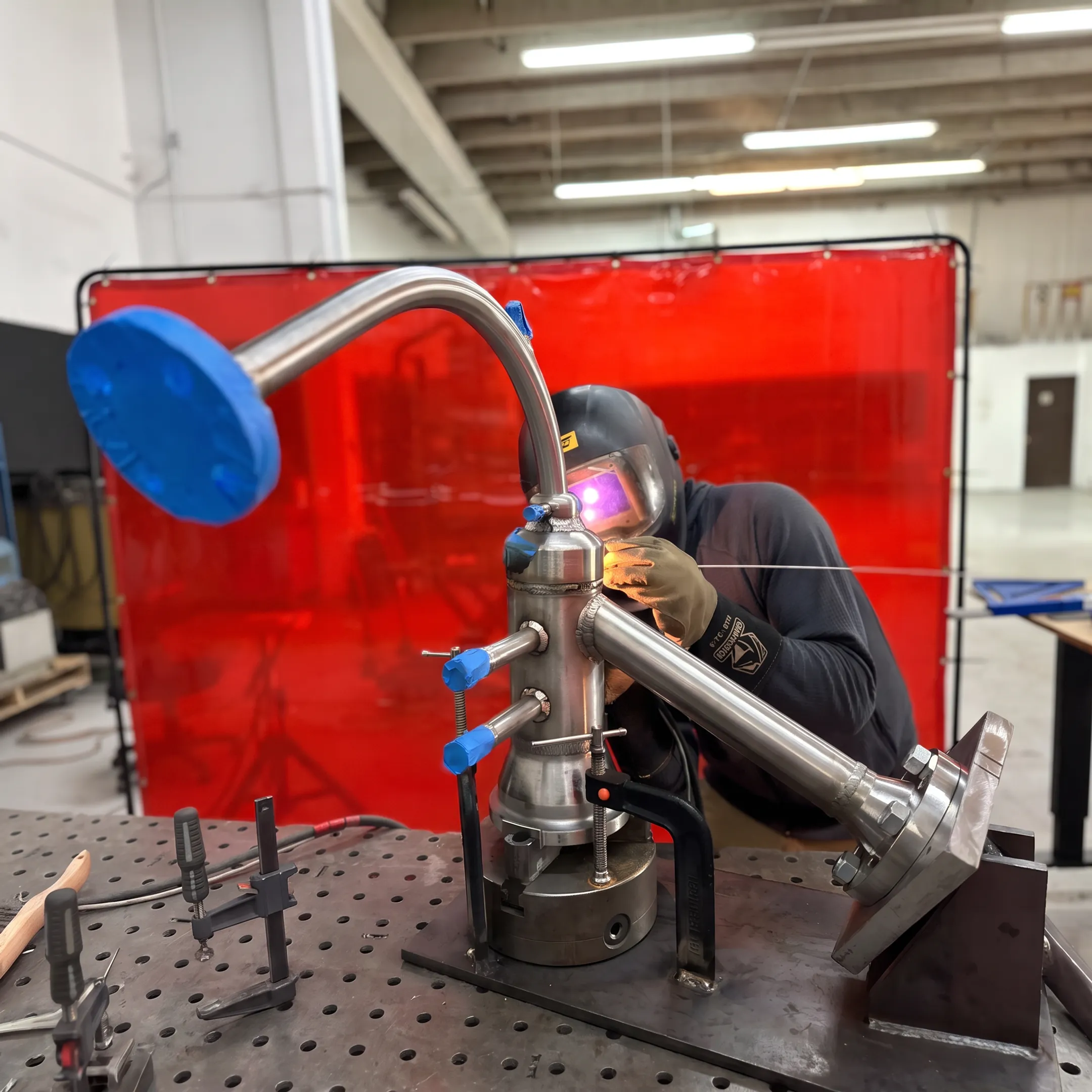Controlled TIG welding of a specialty alloy component