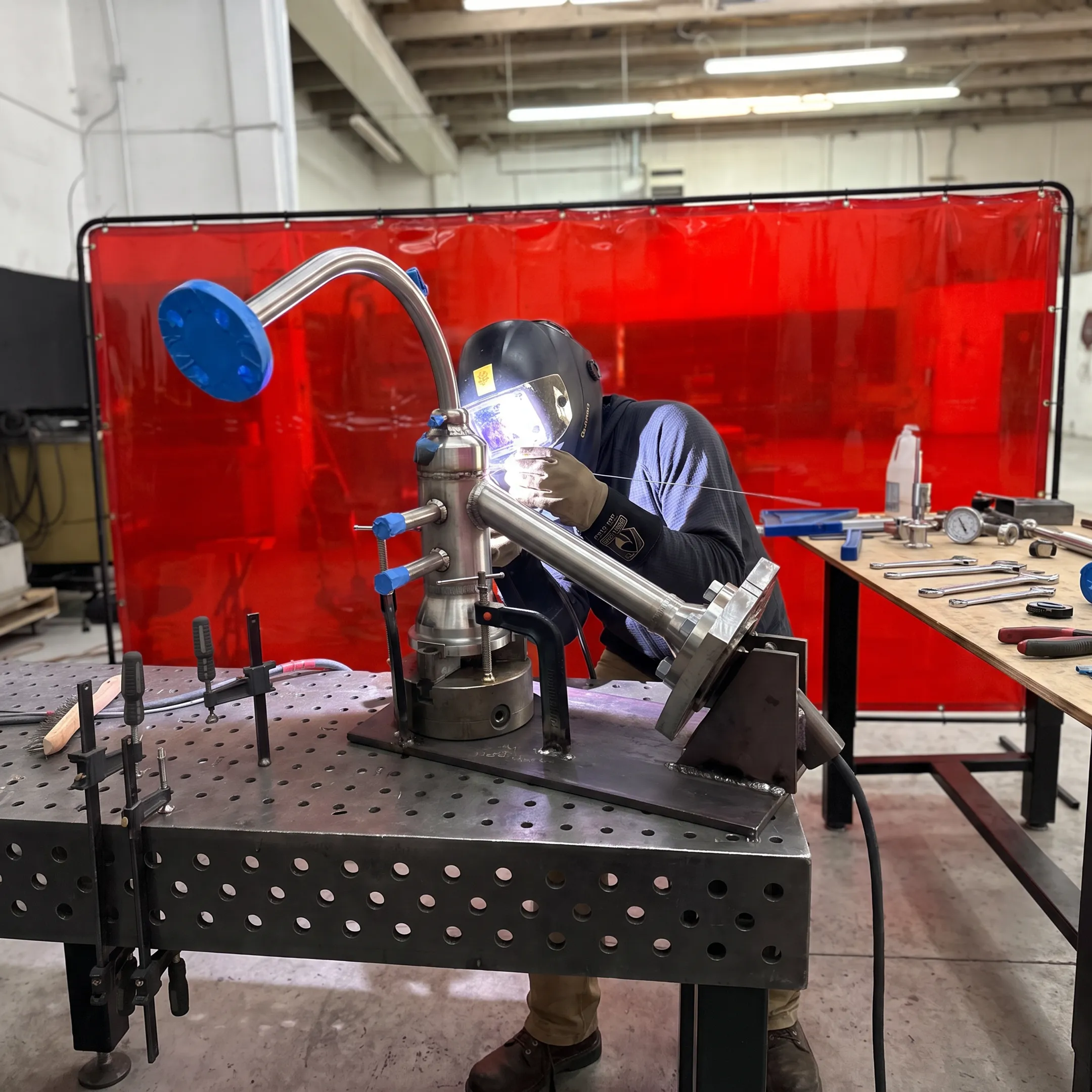Precision TIG welding on a stainless steel pipe system