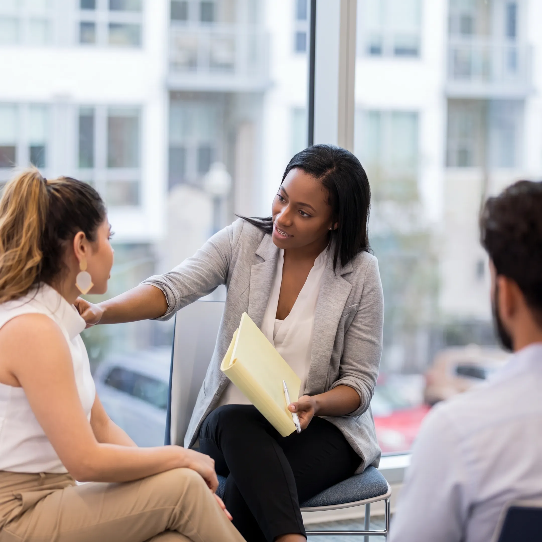 Adult receiving compassionate support during partial hospitalization treatment