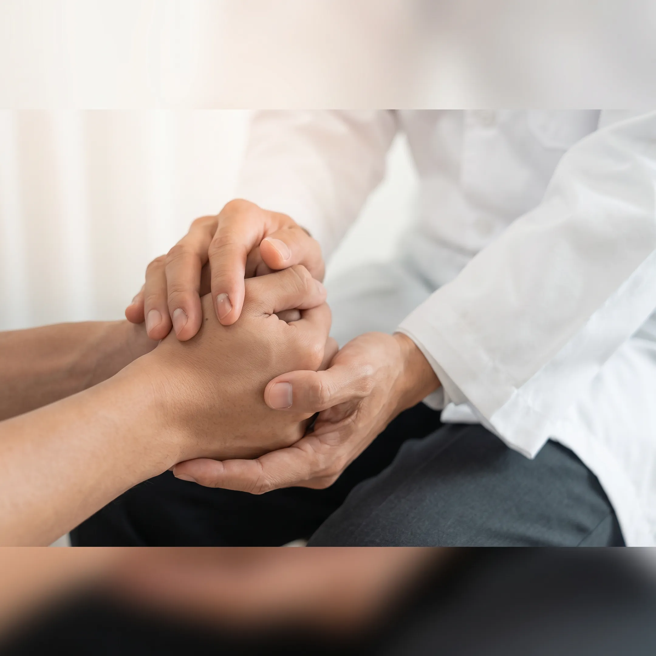 Clinician speaking with an adult receiving behavioral health crisis support
