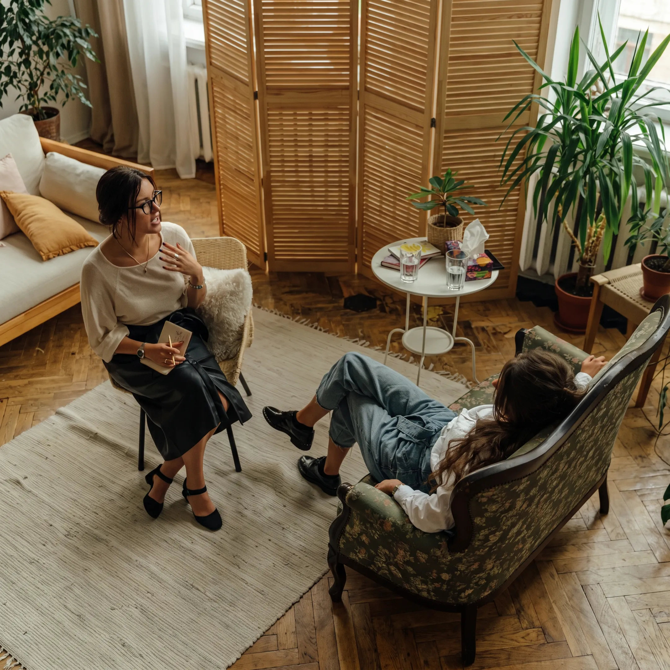 Clinician providing compassionate residential mental health support to an adult client