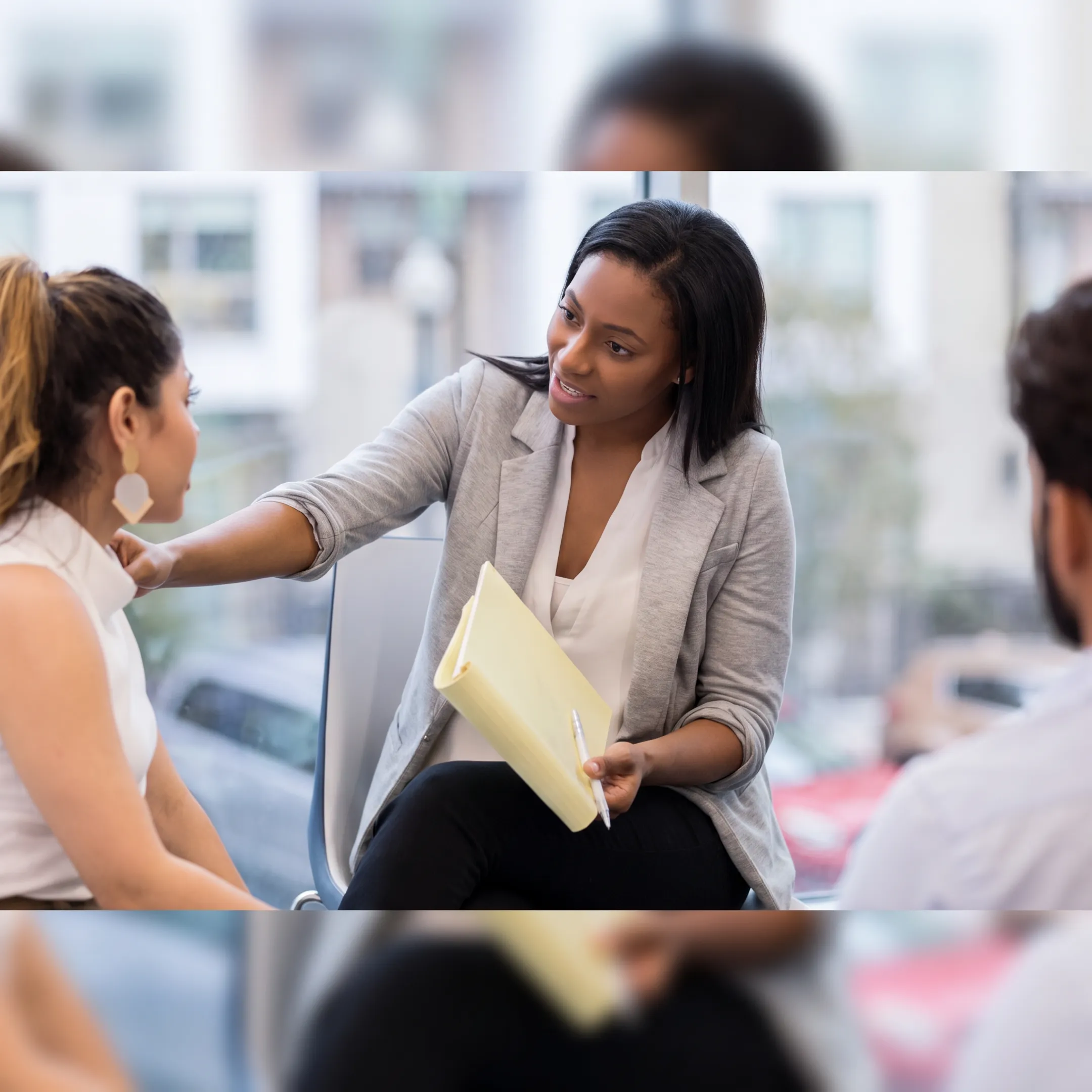 Clinician speaking with an adult receiving behavioral health crisis support