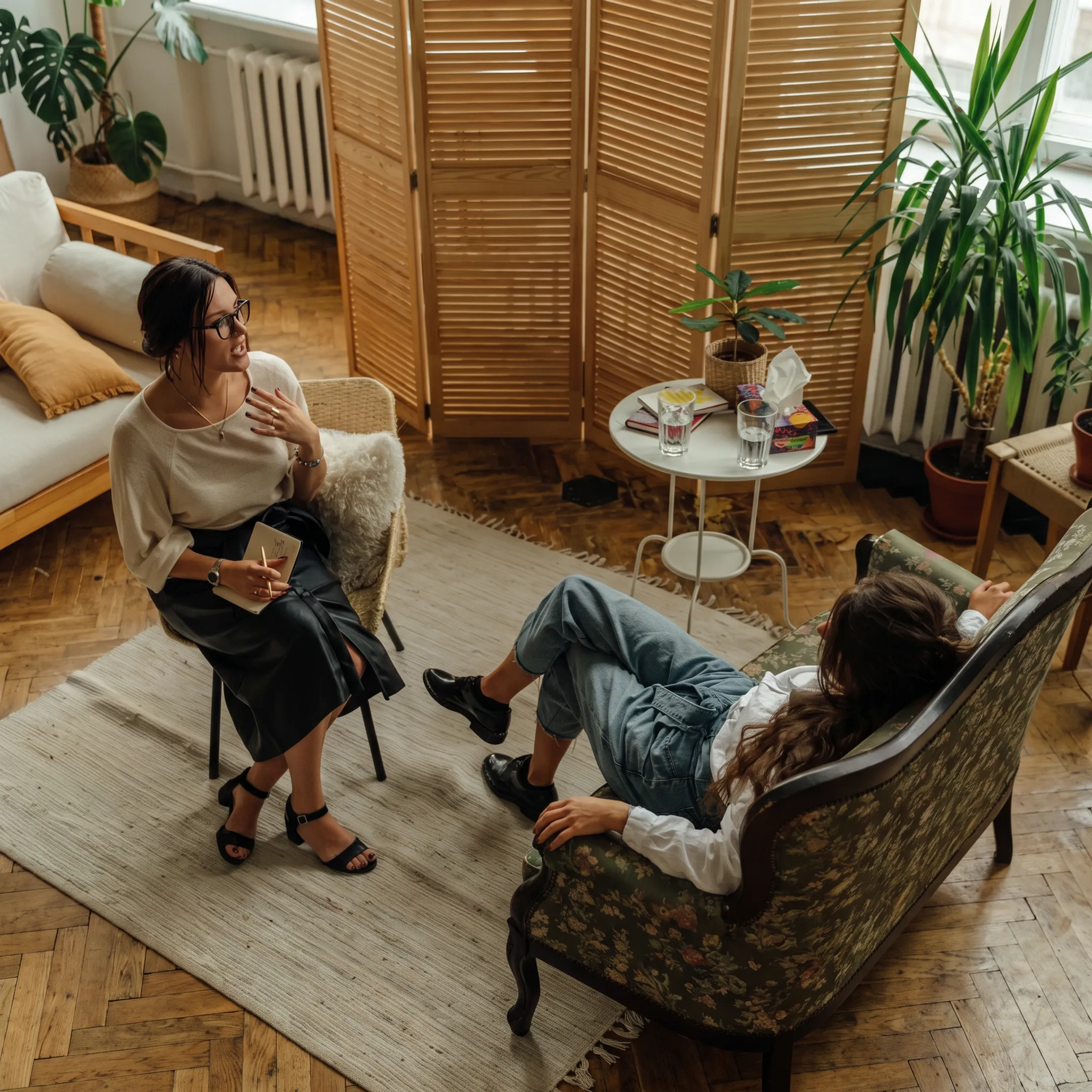Clinician reviewing medication concerns with an adult client
