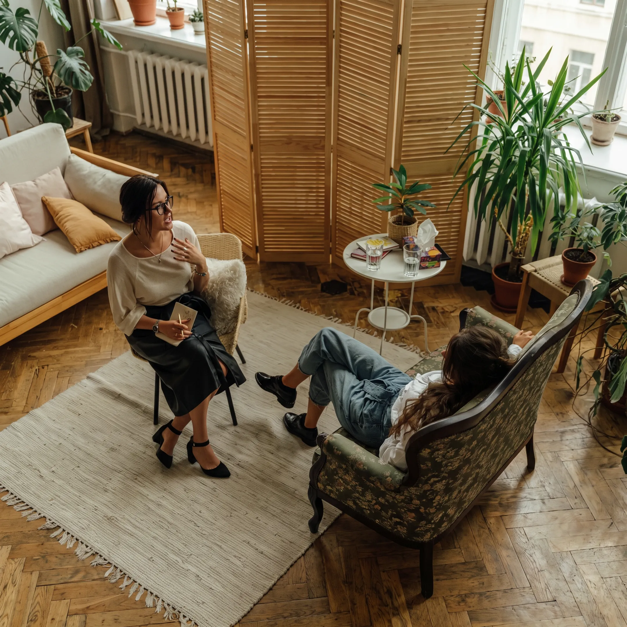 Clinician providing personalized residential mental health therapy to an adult client