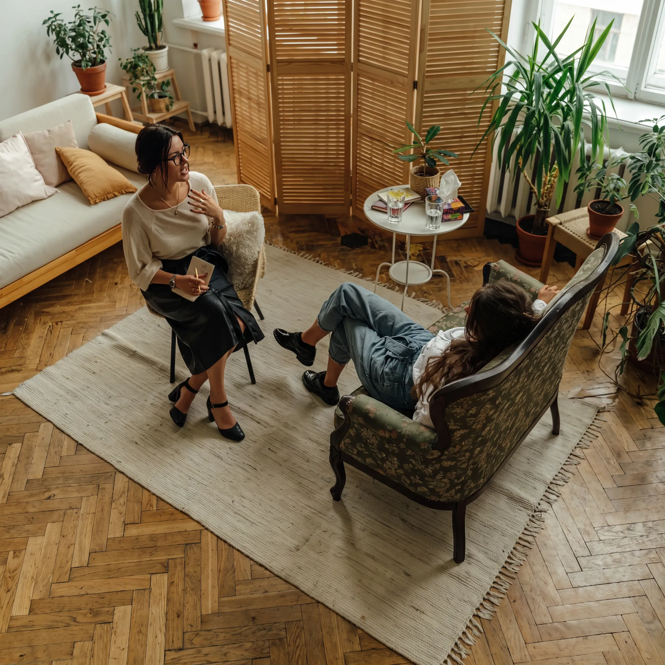 Adult client meeting with a behavioral health therapist during depression treatment