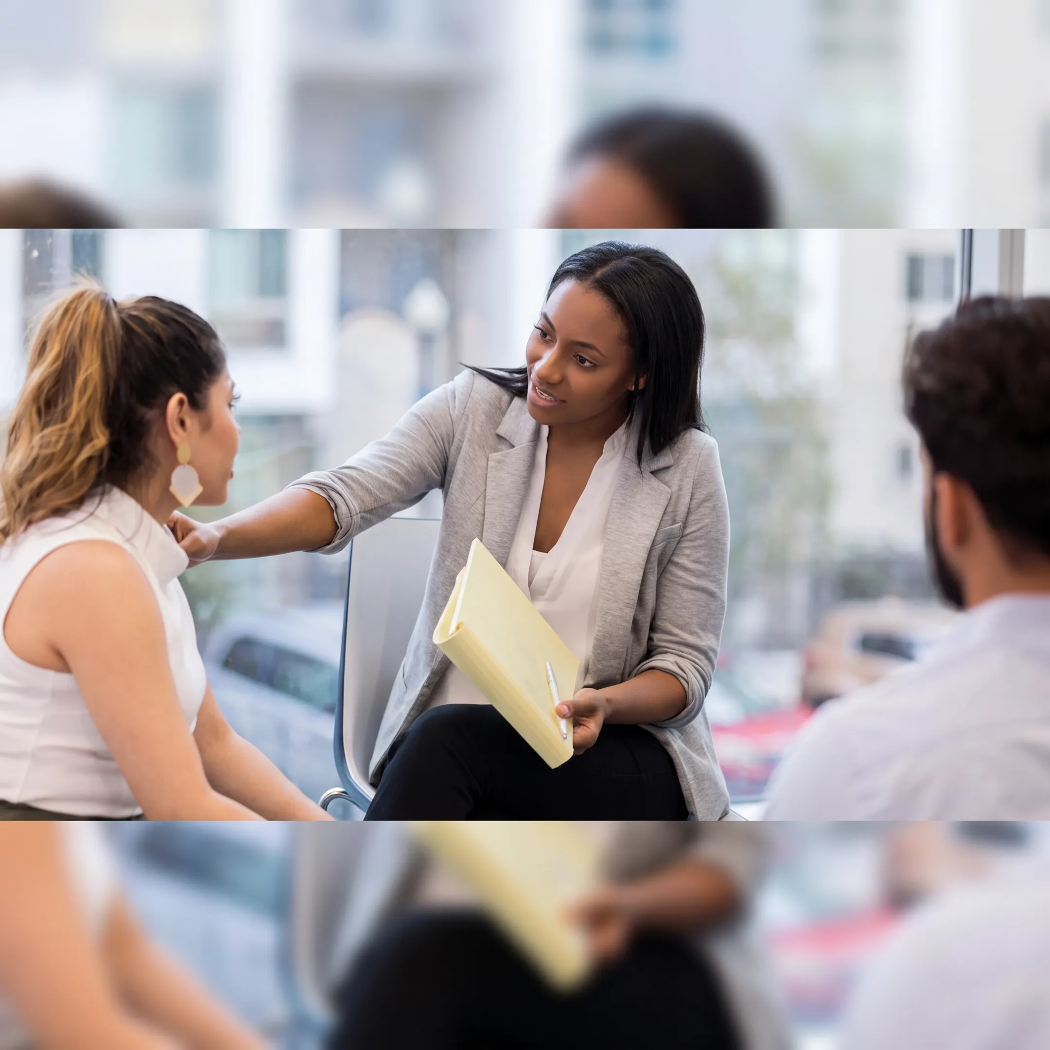 Behavioral health clinician reviewing treatment options with a client