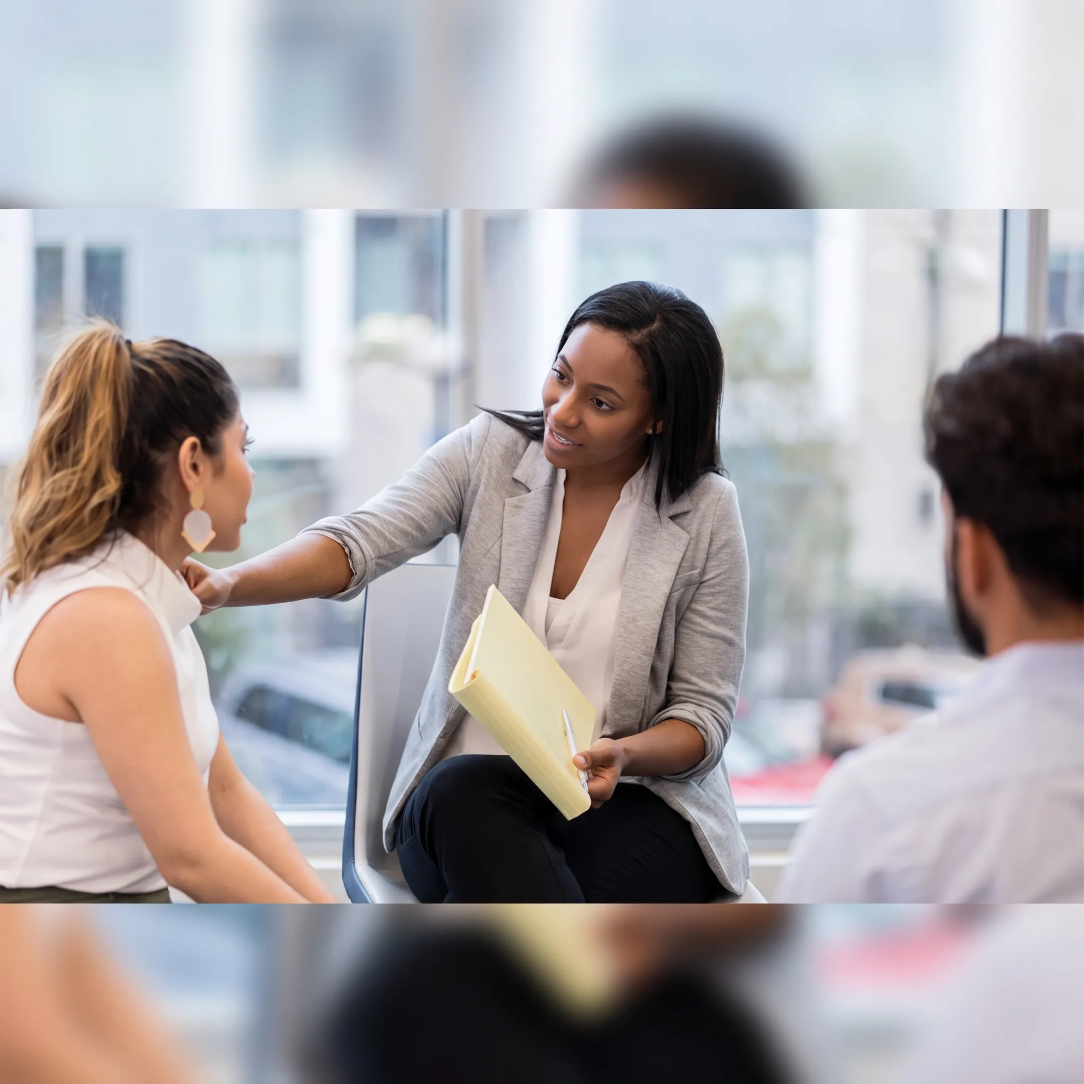 Behavioral health professional reviewing medication information with a client