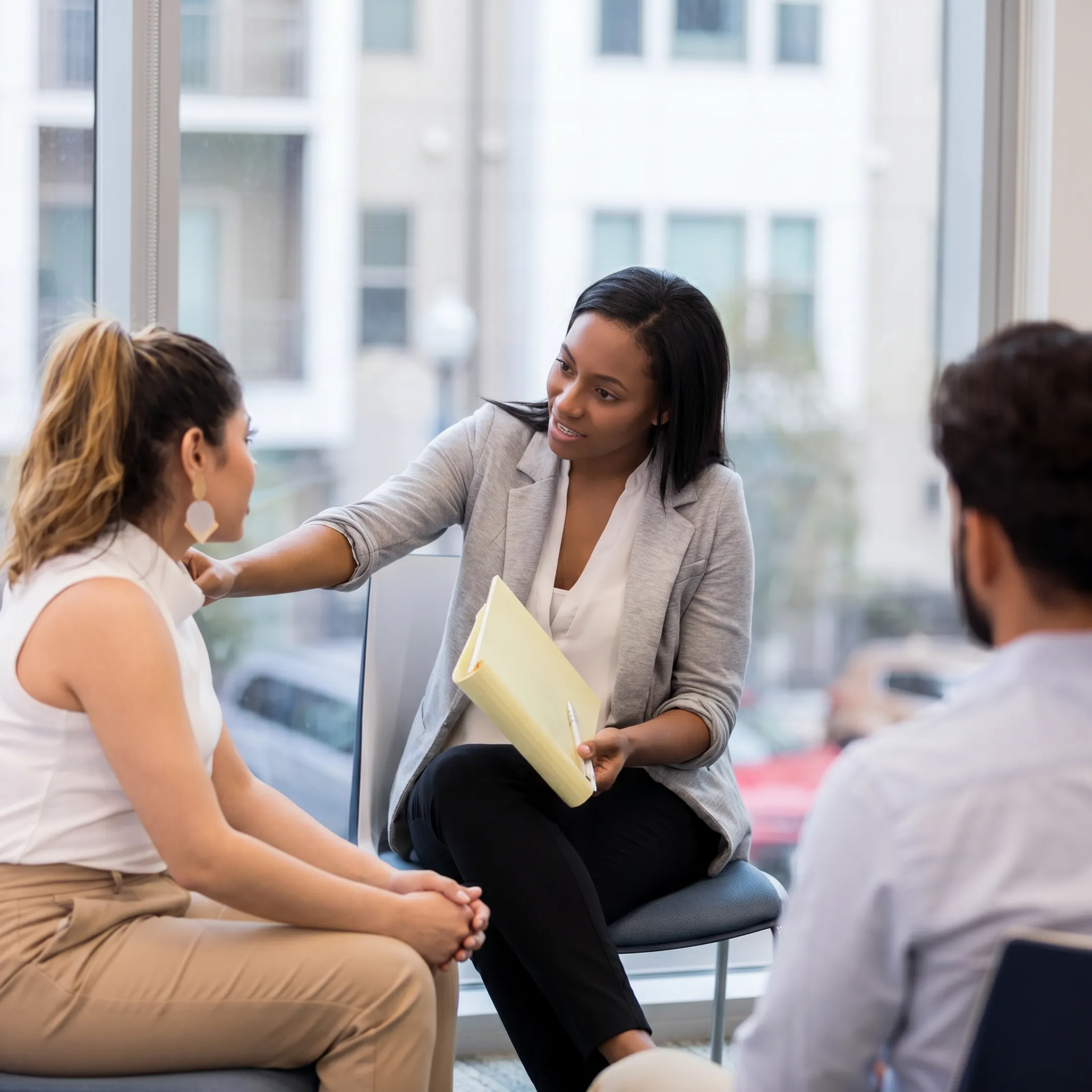 Behavioral health professional meeting with a client during crisis stabilization care