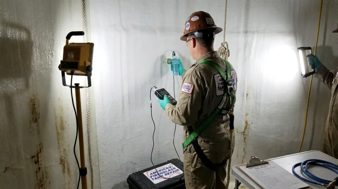 FRP tank interior inspection using ultrasonic and backlight testing methods on liner surface