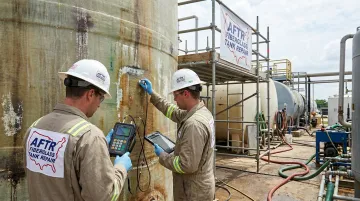 FTPI-certified inspector performing ultrasonic testing on FRP storage vessel interior