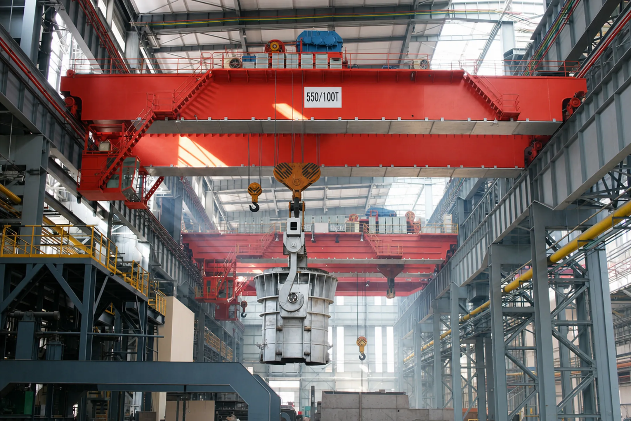 Heavy-duty wire rope bridge crane operating in steel manufacturing facility