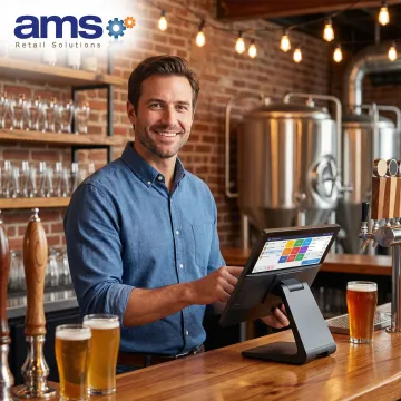AMS Retail Solutions technician configuring a brewery POS system at a taproom bar