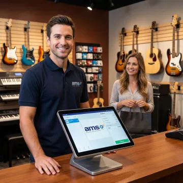 Music store employee demonstrating POS software on a touchscreen terminal
